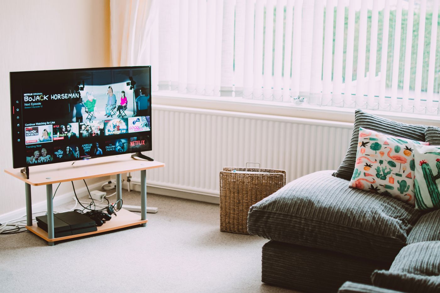 Flat-screen TV mounted on a living room wall